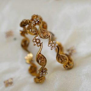 Antique Gold Finish Lakshmi Bangles with Floral CZ Detailing