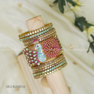 Fuchsia Bloom Peacock Kundan Bangle Set