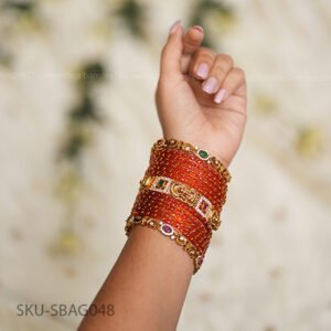 Royal Swirl & Divyaratna Lakshmi Red Bangle Set