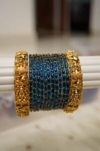 Lakshmi Vilas Peacock Blue Raindrop Temple Set