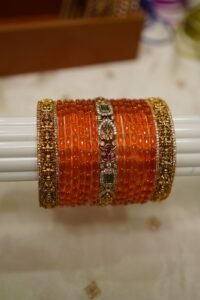 Swarnaratna Lakshmi Orange Temple Bangle Set